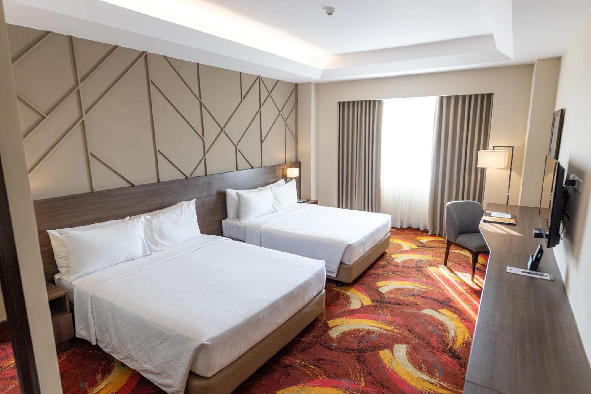 קואזון סיטי Luxent Hotel מראה חיצוני תמונה