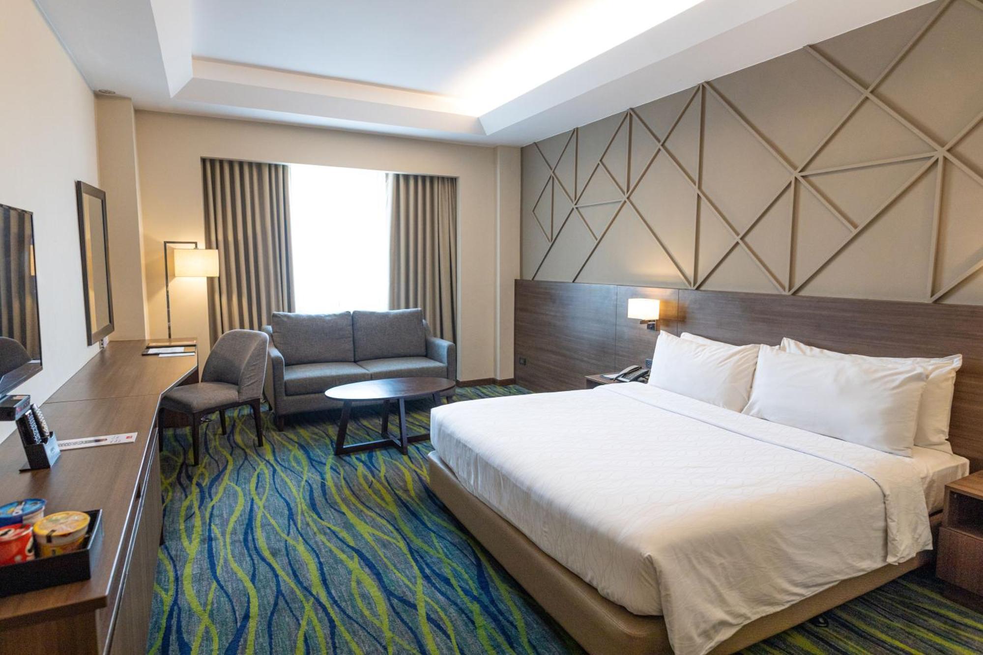 קואזון סיטי Luxent Hotel מראה חיצוני תמונה