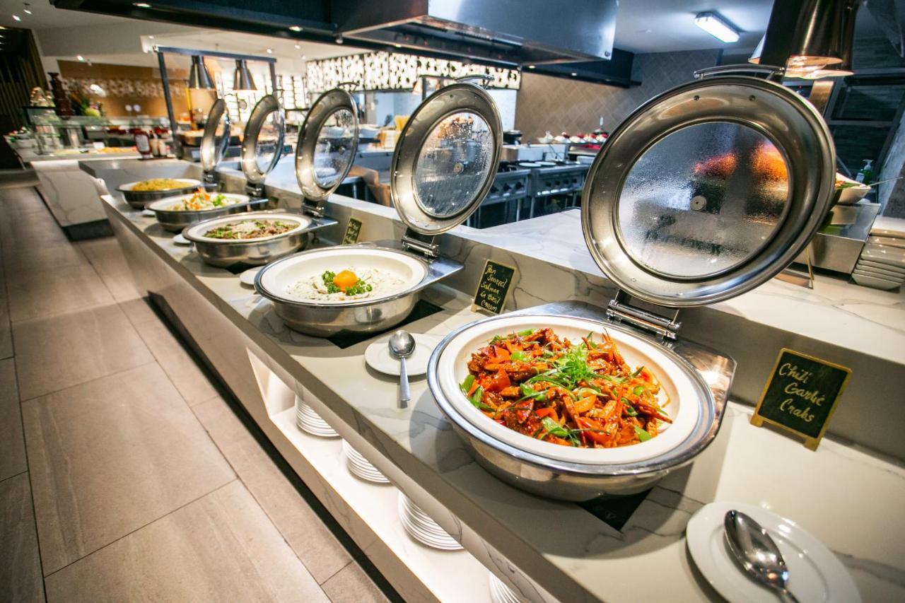 קואזון סיטי Luxent Hotel מראה חיצוני תמונה