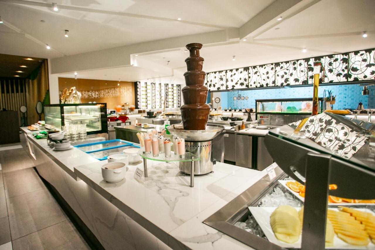 קואזון סיטי Luxent Hotel מראה חיצוני תמונה