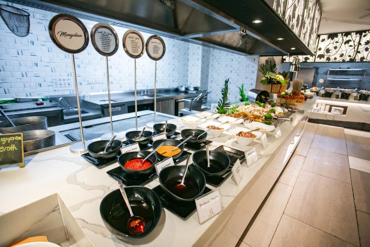 קואזון סיטי Luxent Hotel מראה חיצוני תמונה