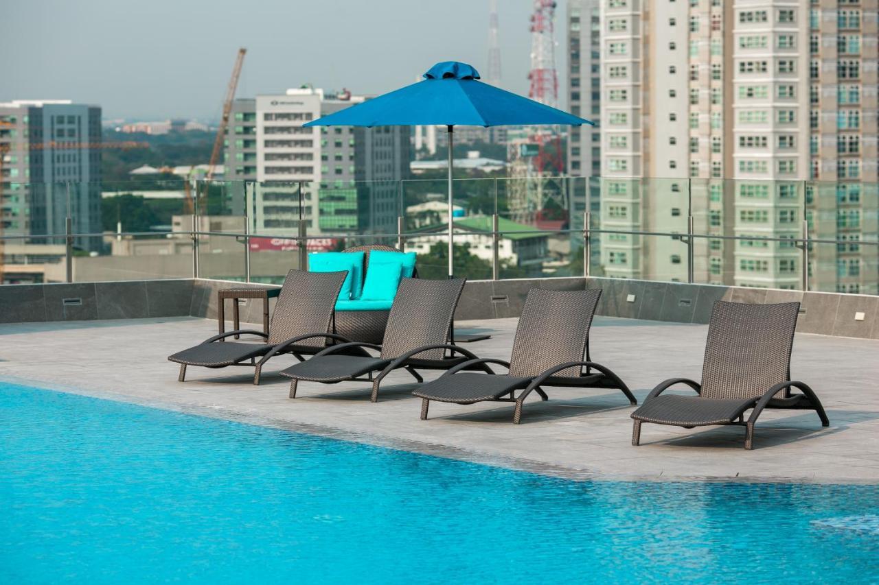 קואזון סיטי Luxent Hotel מראה חיצוני תמונה